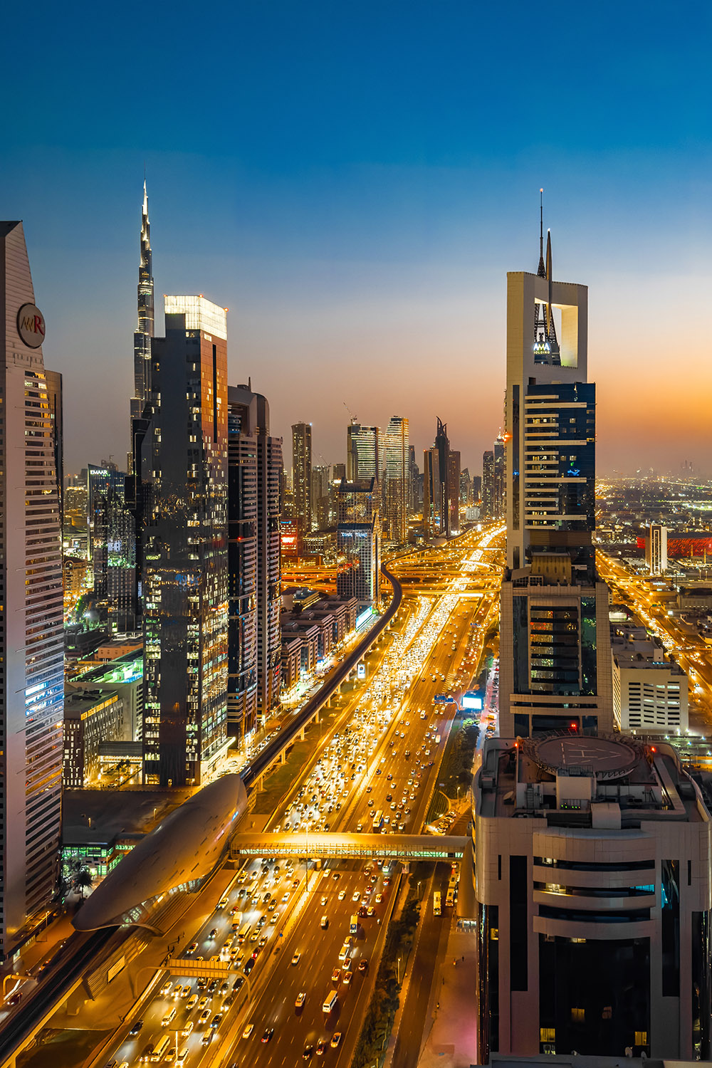 View of Sheikh Zayed Road at sunset in Dubai Downtown Financial center, UAE